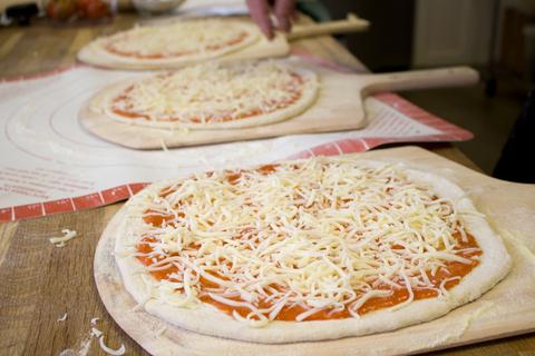 spread pizza dough